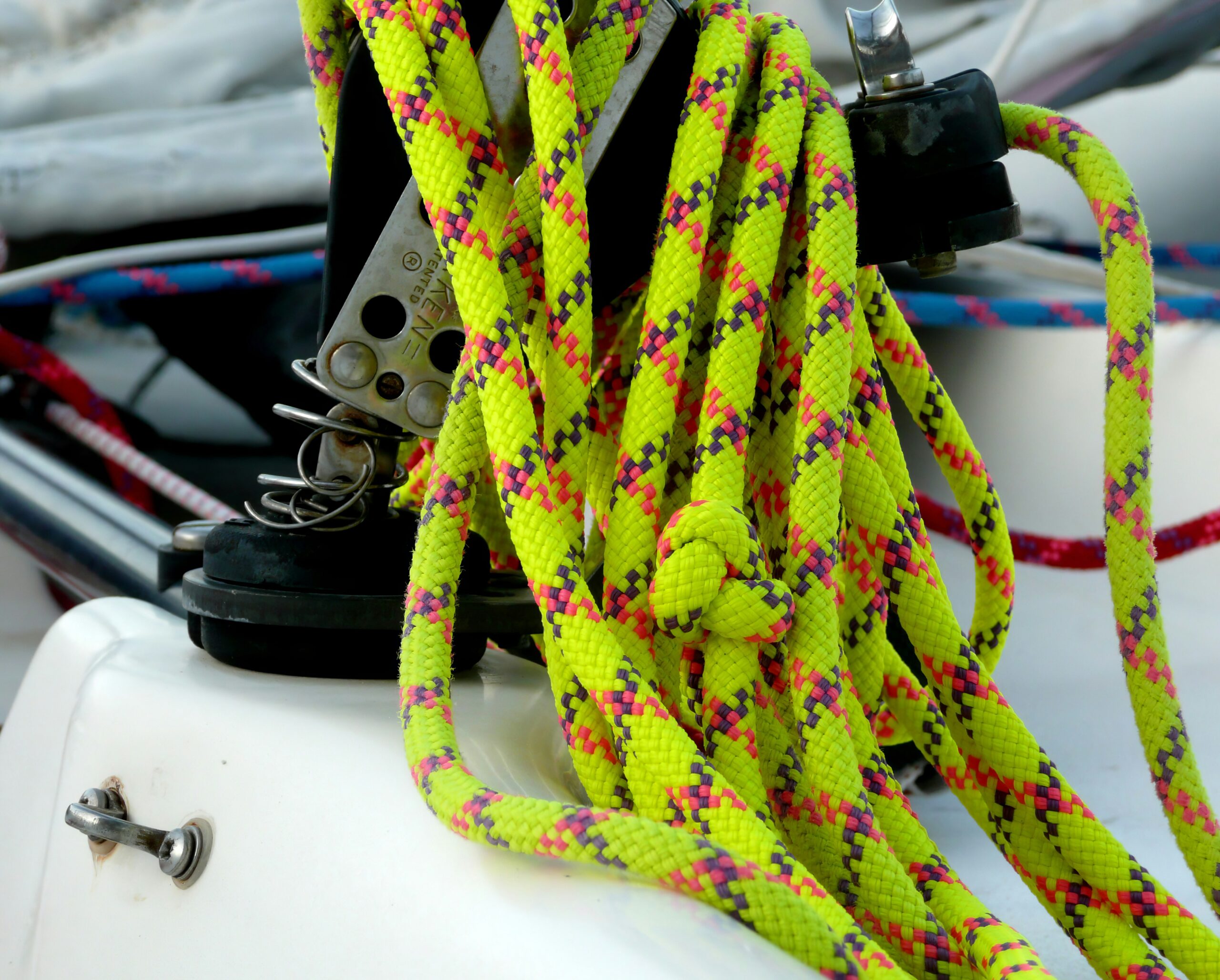 Close-up comparison between a regular harness and a lightweight rope ready harness.
