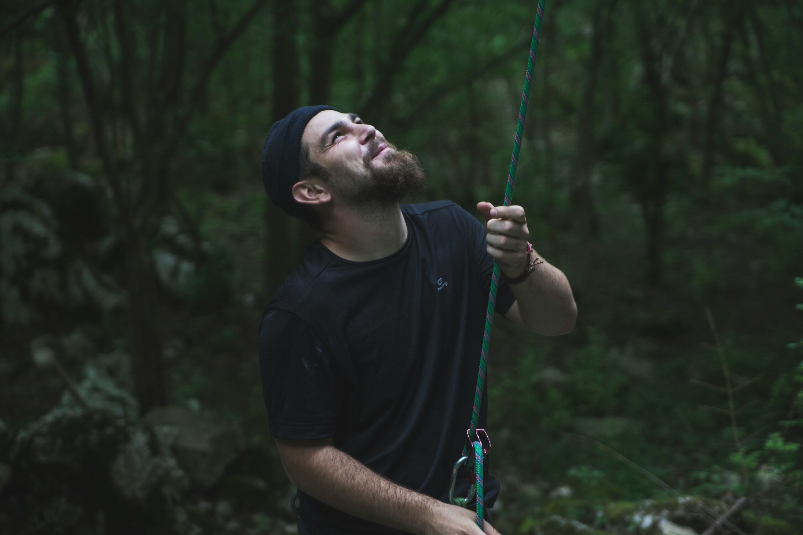 Climber wearing a well-fitted secure climb harness at sunset.