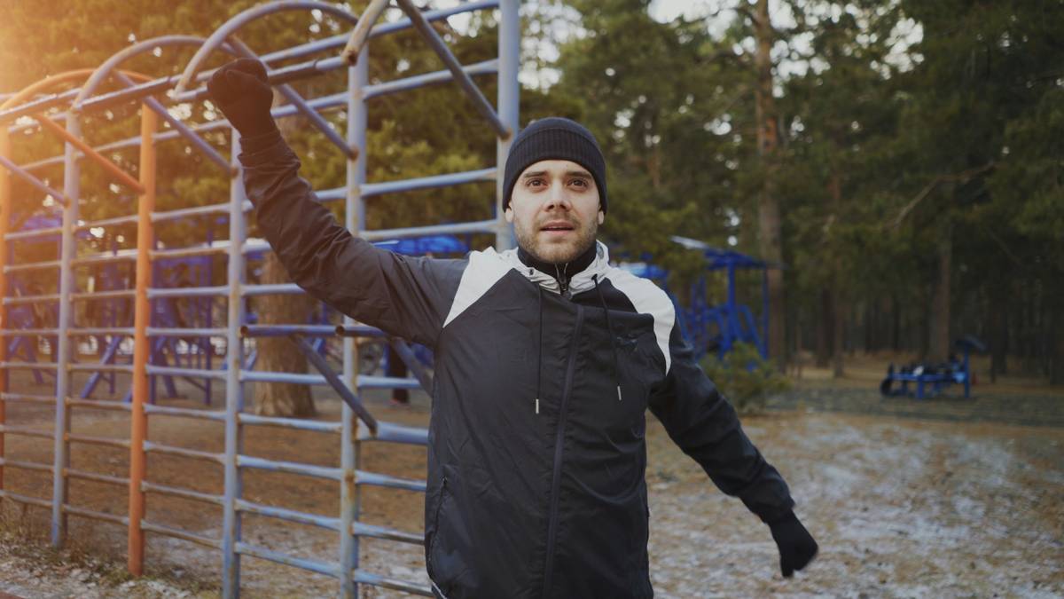 Person using a climbing harness during an indoor workout session