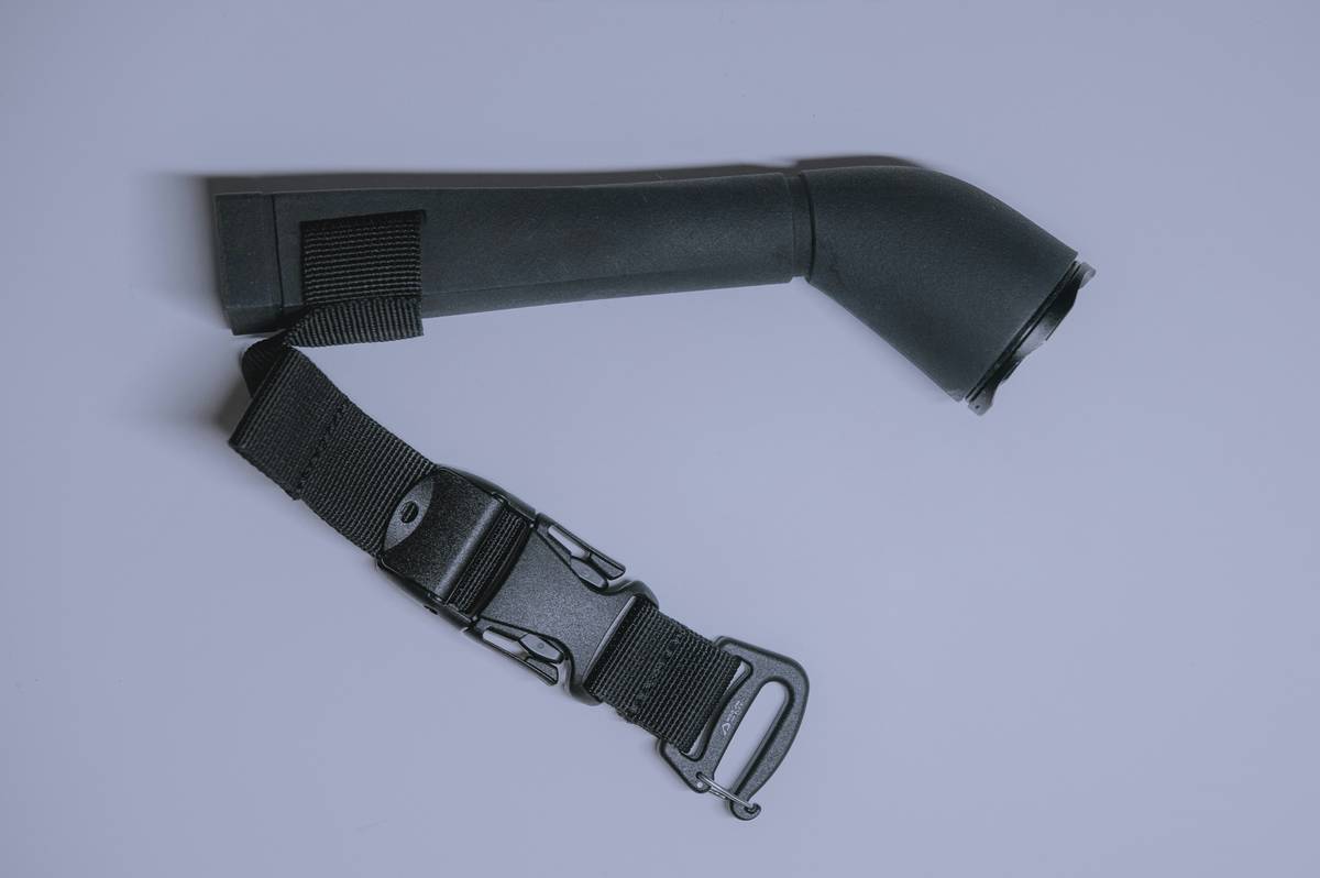 A frustrated climber adjusting an uncomfortable harness