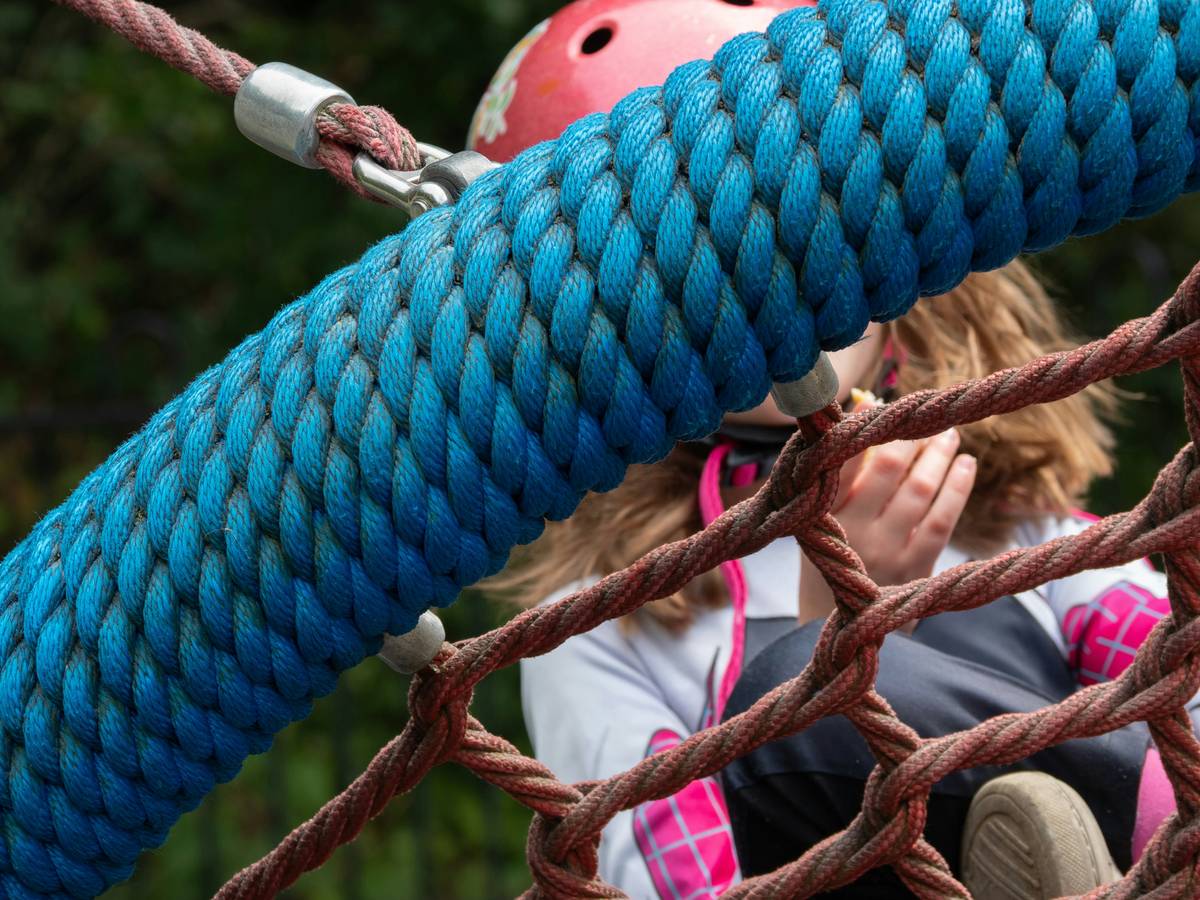 Illustration showing proper fitting of a child-sized climbing harness